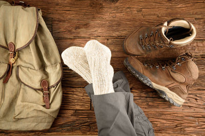 High angle view of shoes on wooden table