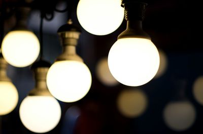 Close-up of illuminated light bulb