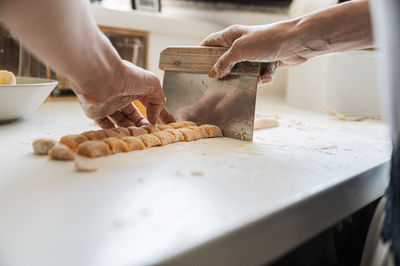 Midsection of person preparing food