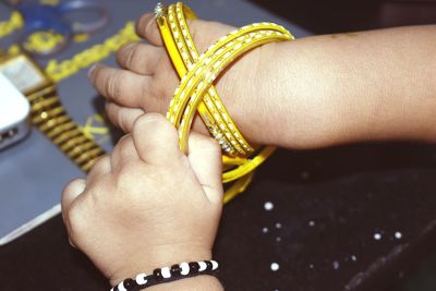 Close-up of woman holding hands