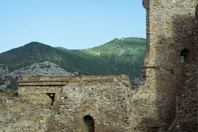 View of fort against mountain