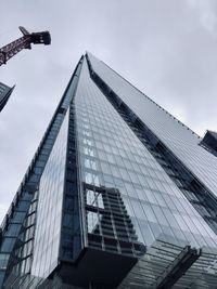 Low angle view of modern building against sky