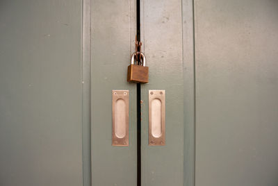 Close-up of padlock on door