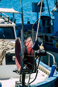 Close-up of fishing boats moored at harbor