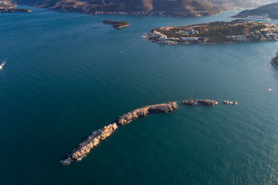 High angle view of city by sea