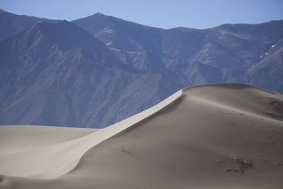 Scenic view of snowcapped mountains against sky in tibet.