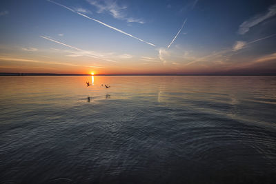 Scenic view of sunset over sea