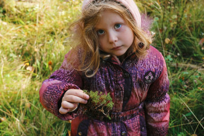 Portrait of a girl in a field