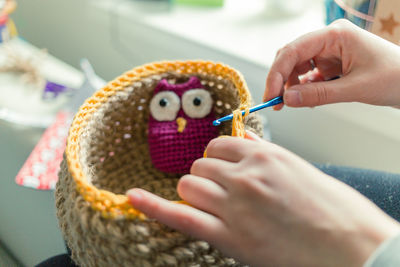 Close-up of owl in a basket 