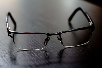 Close-up of sunglasses on table