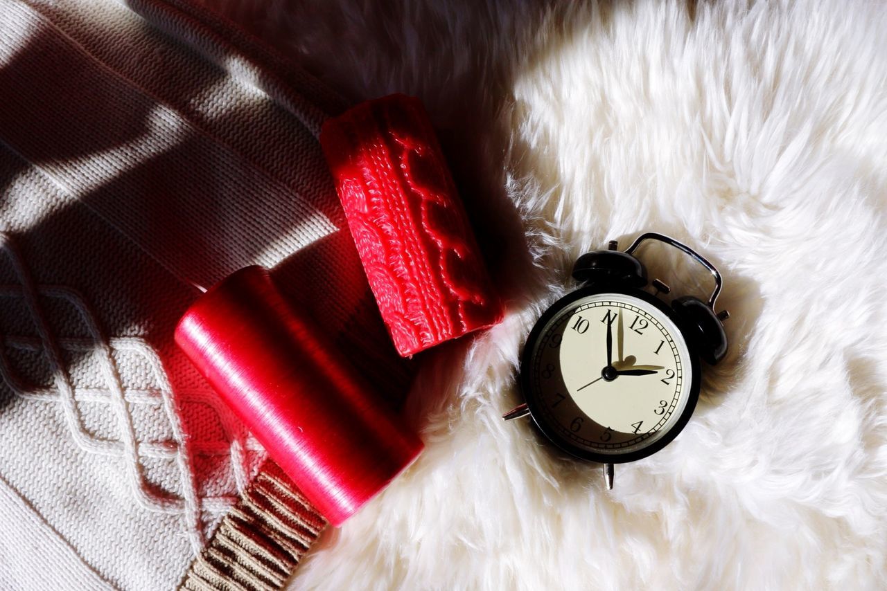 indoors, close-up, communication, still life, red, no people, white color, technology, high angle view, retro styled, wall - building feature, time, old-fashioned, single object, text, number, clock, toy, man made object, table