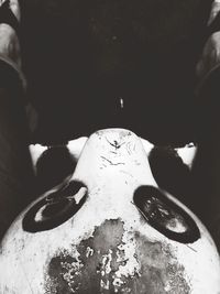 Close-up of woman standing on tiled floor