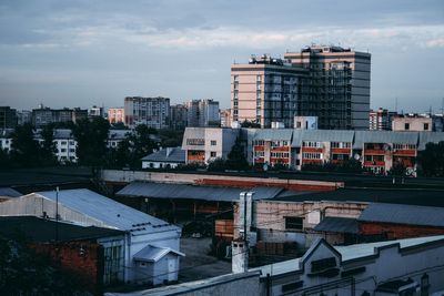 High angle view of buildings in city against sky