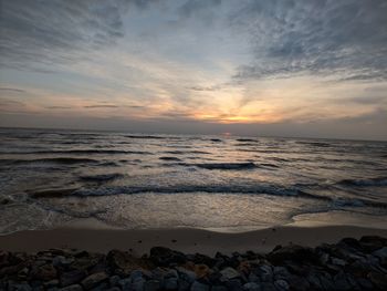 Scenic view of sea against sky during sunset