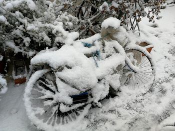 Snow on bicycle during winter