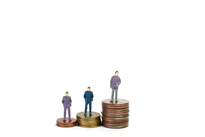 Stack of two people against white background