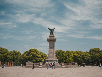 Group of people in front of historical building