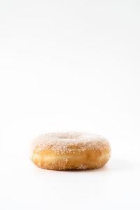 Close-up of pastry against white background