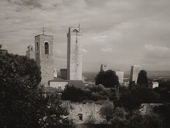 Buildings in city against sky