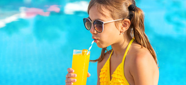 Girl drinking juice