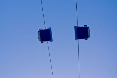 Low angle view of street light against clear sky