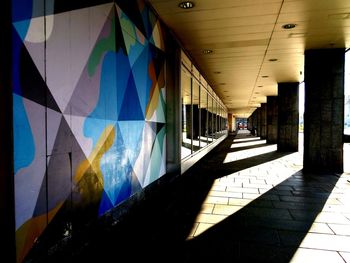 Multi colored shadow of building