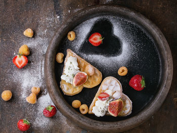 Directly above shot of dessert in tray on table