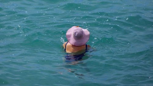 High angle view of woman in sea