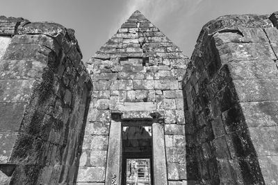 Low angle view of old building against sky