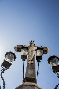 Low angle view of statue against clear sky