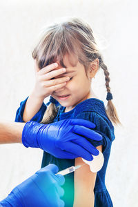 Side view of young woman looking away