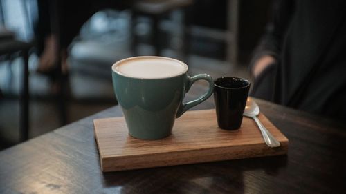 Close-up of coffee served on table