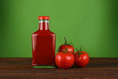 Close-up of red bell peppers on table