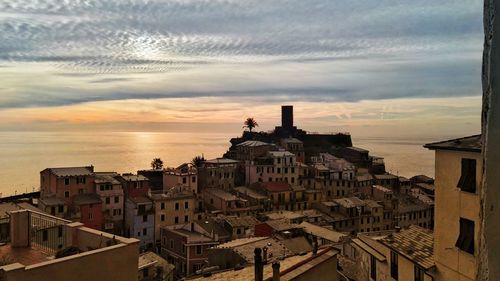 High angle view of townscape against sky at sunset