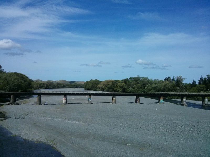 passing a bridge over no water. · new zealand landscape Nature Architecture sunny day blue sky Traveling