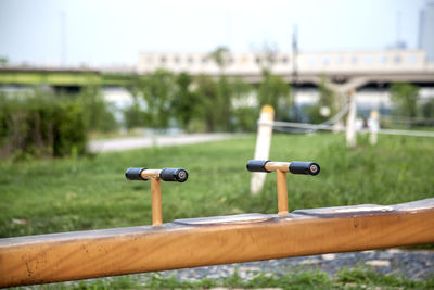 Close-up of railing against blurred background