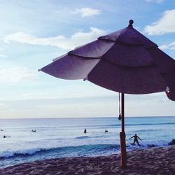 Scenic view of beach against sky