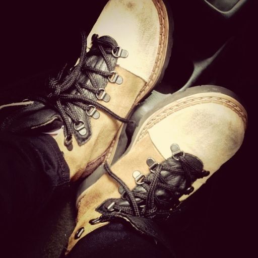 shoe, low section, indoors, personal perspective, high angle view, close-up, footwear, person, pair, still life, part of, night, men, fashion, canvas shoe, unrecognizable person, shadow