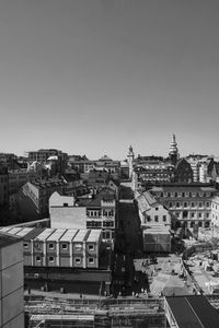 High angle view of buildings in city against clear sky