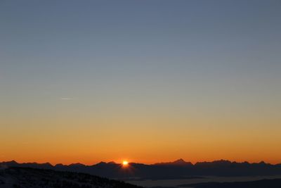 Scenic view of mountains at sunset