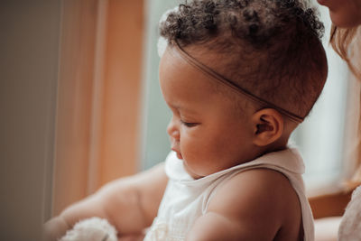 Portrait of boy looking at home