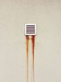 Close-up of flag on wall