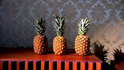 Pineapples on table in home
