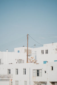 Low angle view of buildings against clear sky