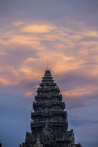 Low angle view of temple against sky during sunset