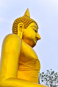 Low angle view of statue against sky