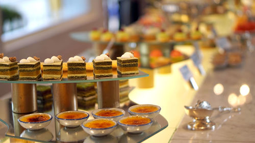 Line of dessert buffet coloful sweets cake beautifully display on top