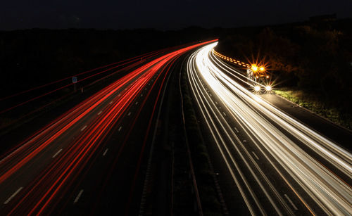 Light trails on road at night