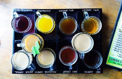 High angle view of multi colored bottles