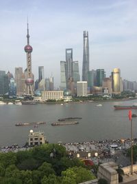 View of buildings in city at waterfront